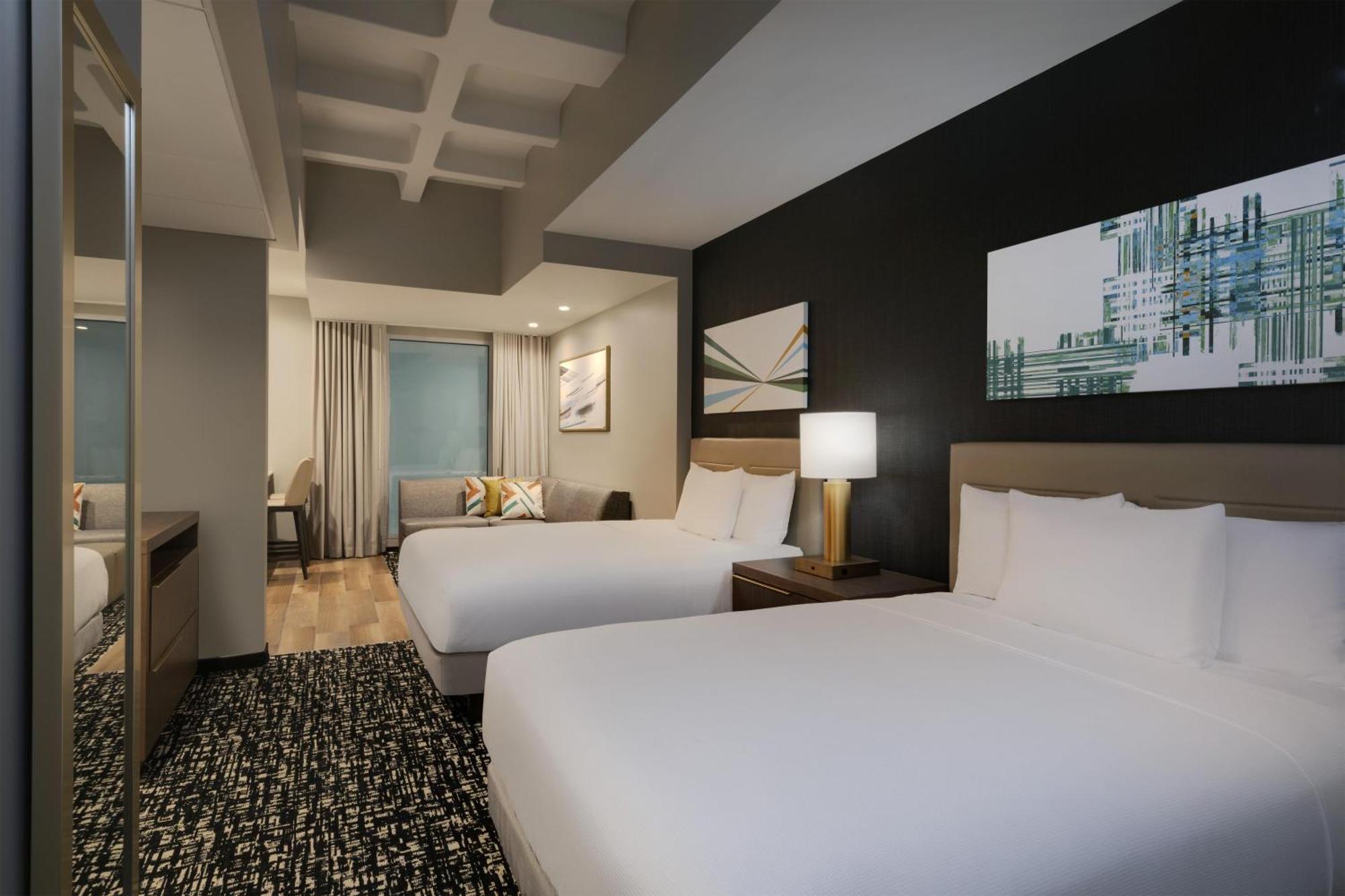 Studio Kitchen Suite Interior Room | Two Queen Beds Plus Sofa Bed